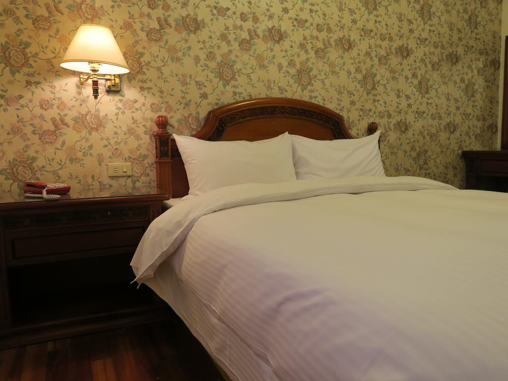 Champagne Hotel Ťiao-si Pokoj fotografie