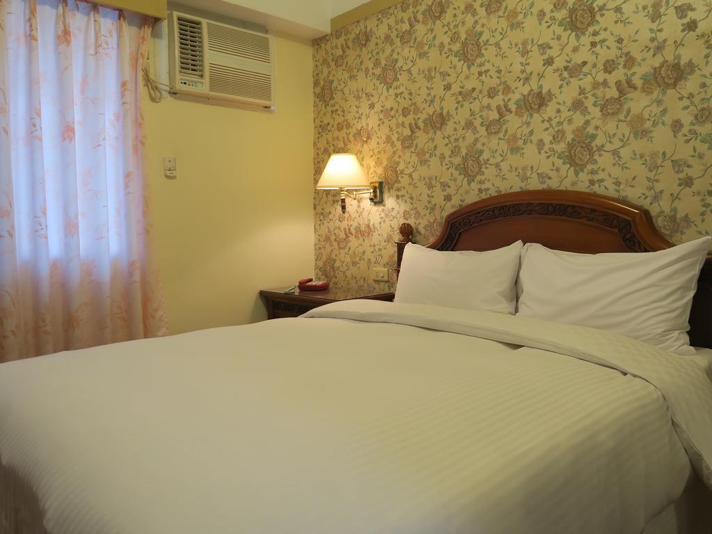 Champagne Hotel Ťiao-si Pokoj fotografie